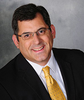 Associate Vice President for Auxiliary and Business Services John Papazoglou
